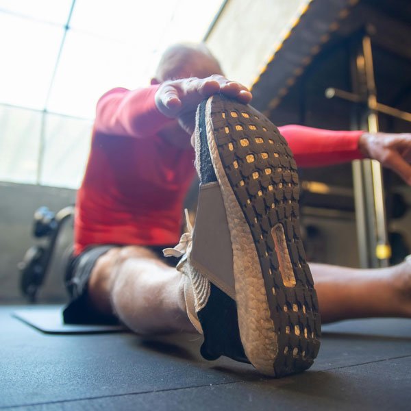 Image of older gentleman stretching